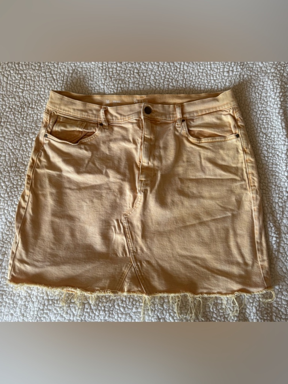 a.n.a. Women’s light yellow Denim Mini Skirt with Frayed Hem